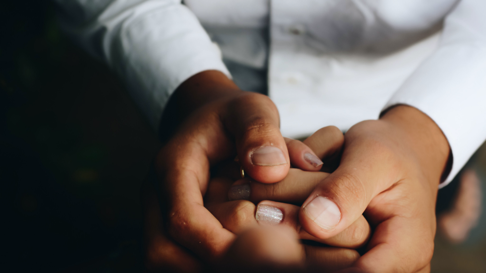 Hands holding hands